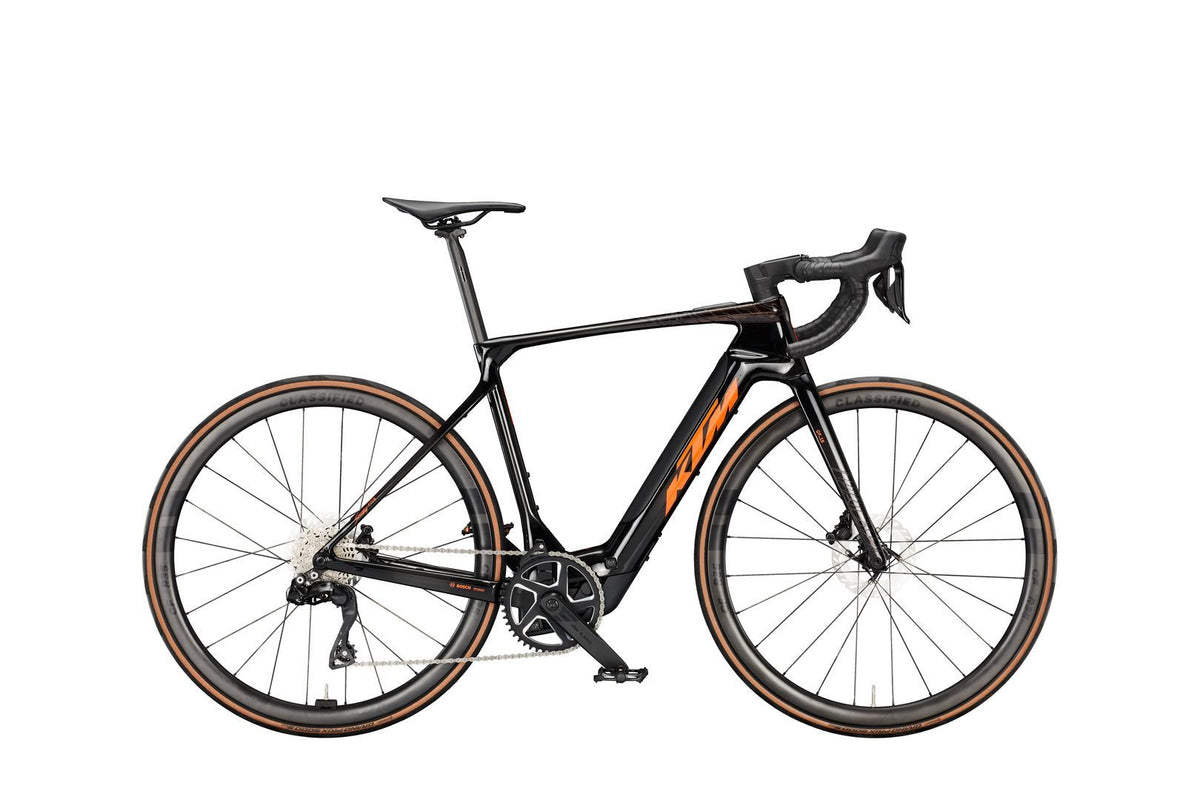 Macina Revelator SX Prime - CARBON (ORANGE+BLACK MATT) L/57